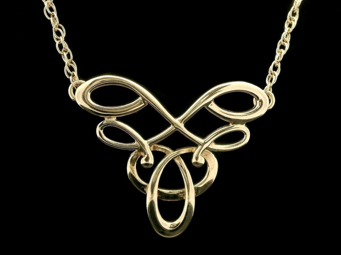 Ola Gorie 9ct Yellow Gold Tudor Pendant with 17 Rope Necklace: Ola Gorie 9ct Yellow Gold Tudor Pendant with 17 Rope Necklace This exquisite necklace features a stunning open large Tudor pendant crafted from solid 9ct yellow gold, suspended on a 17-inch rope link 