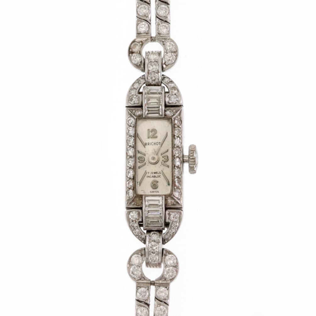 Brichot 2.5ct Diamond Platinum Silver Manual Ladies Wristwatch: Brichot 2.5ct Diamond Platinum Silver Manual Ladies Wristwatch This exquisite vintage Brichot ladies wristwatch features a stunning combination of 85% platinum and silver, showcasing a rectangular cas