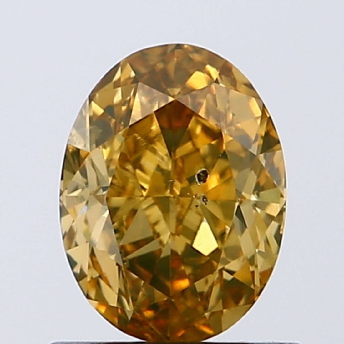 Loose Diamond - OVAL 0.9ct Fancy Deep Yellow SI2: Loose Diamond - OVAL 0.9ct Fancy Deep Yellow SI2 Source: Natural Shape: OVAL Carats: 0.9 Color: Fancy Deep Yellow Certification: GIA Video: