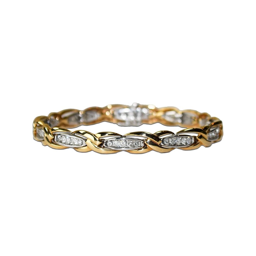 Diamond Tennis Bracelet 14K Two Tone Gold 7.4 In: Diamond Tennis Bracelet 14K Two Tone Gold 7.4 In Pre-owned ladies' 14k two-tone gold tennis bracelet set with natural round brilliant diamonds. This bracelet features a push lock closure and is stampe
