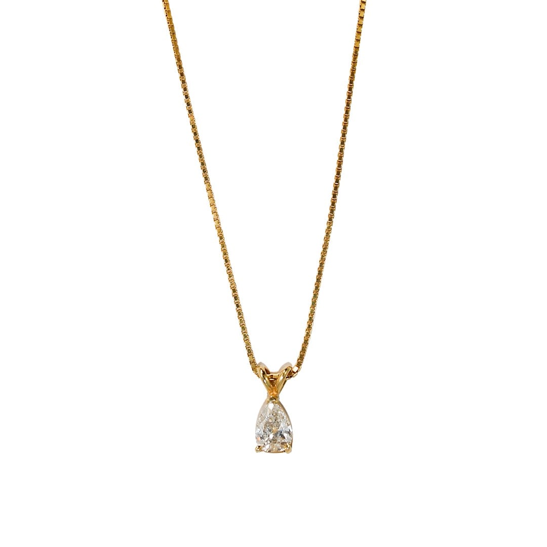 Pear Diamond Pendant Necklace 14K 18K Yellow Gold 19 in Box Link: Pear Diamond Pendant Necklace 14K 18K Yellow Gold 19 in Box Link This elegant necklace features a pear-shaped natural diamond set in a 14K yellow gold mounting, complemented by a 19-inch 18K yellow go