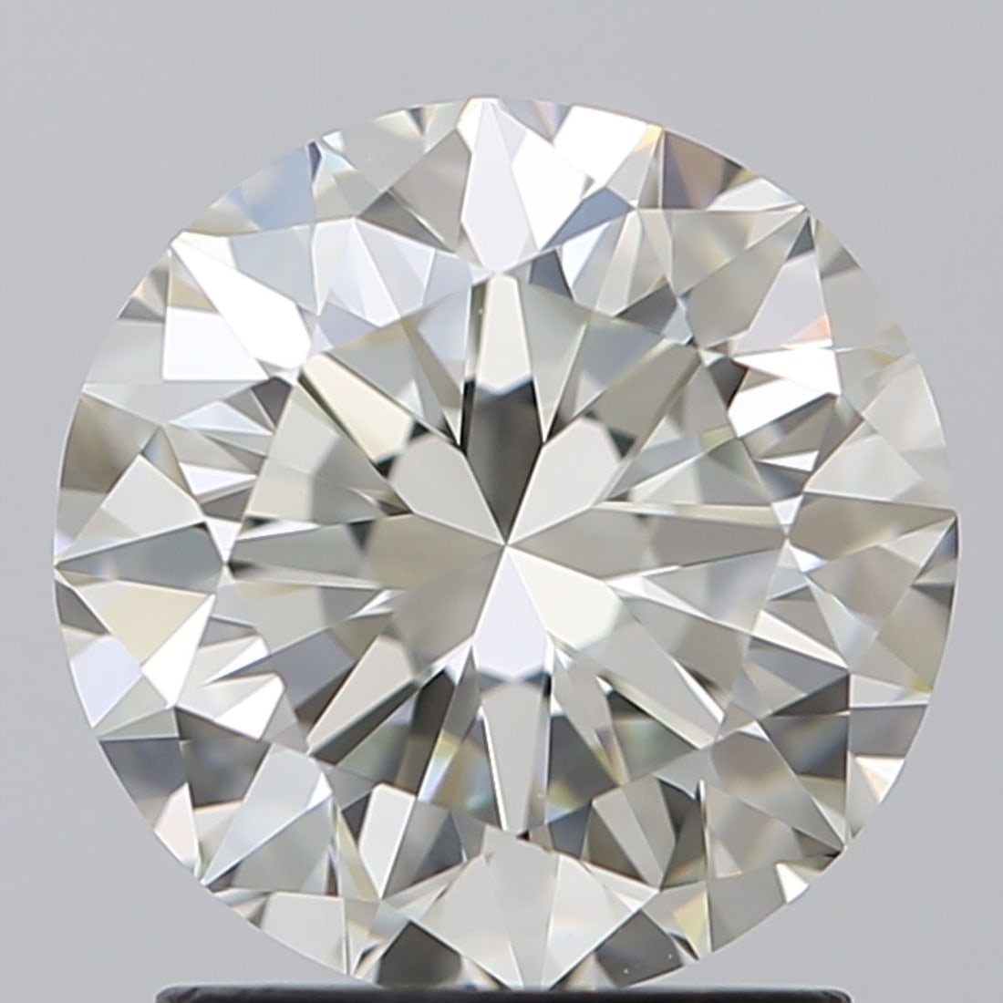 Loose Diamond - ROUND 1.9ct J VVS1: Loose Diamond - ROUND 1.9ct J VVS1 Source: Natural Shape: ROUND Carats: 1.9 Color: J Clarity: VVS1 Certification: IGI Video: