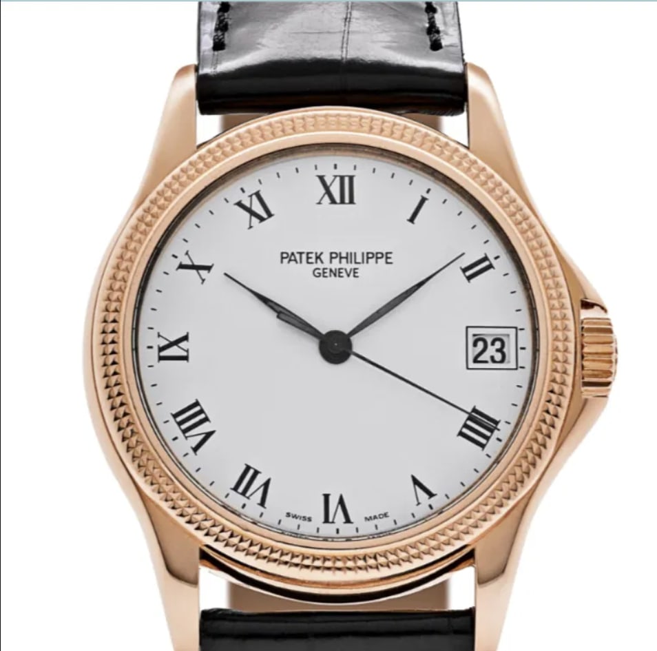 Patek Philippe Calatrava 5117R White Roman Dial Leather Band Mens: Patek Philippe Calatrava 5117R White Roman Dial Leather Band Mens This Patek Philippe Calatrava watch features a refined white dial with Roman numerals, complemented by a fluted bezel and a classic le