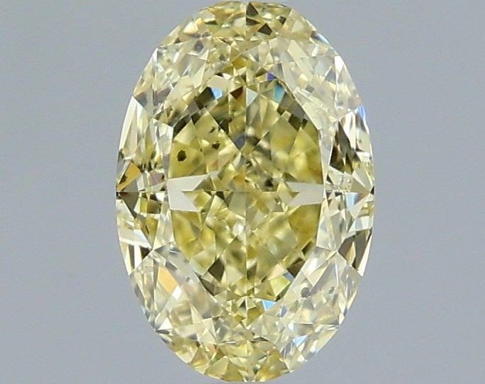 Loose Diamond - OVAL 1.02ct Fancy Yellow SI1: Loose Diamond - OVAL 1.02ct Fancy Yellow SI1 Source: Natural Shape: OVAL Carats: 1.02 Color: Fancy Yellow Certification: GIA Video: