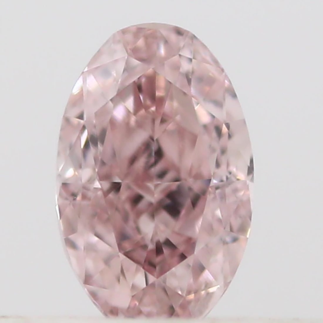 Loose Diamond - OVAL 0.16ct Fancy Orangey Pink VS2: Loose Diamond - OVAL 0.16ct Fancy Orangey Pink VS2 Source: Natural Shape: OVAL Carats: 0.16 Color: Fancy Orangey Pink Certification: GIA Video:
