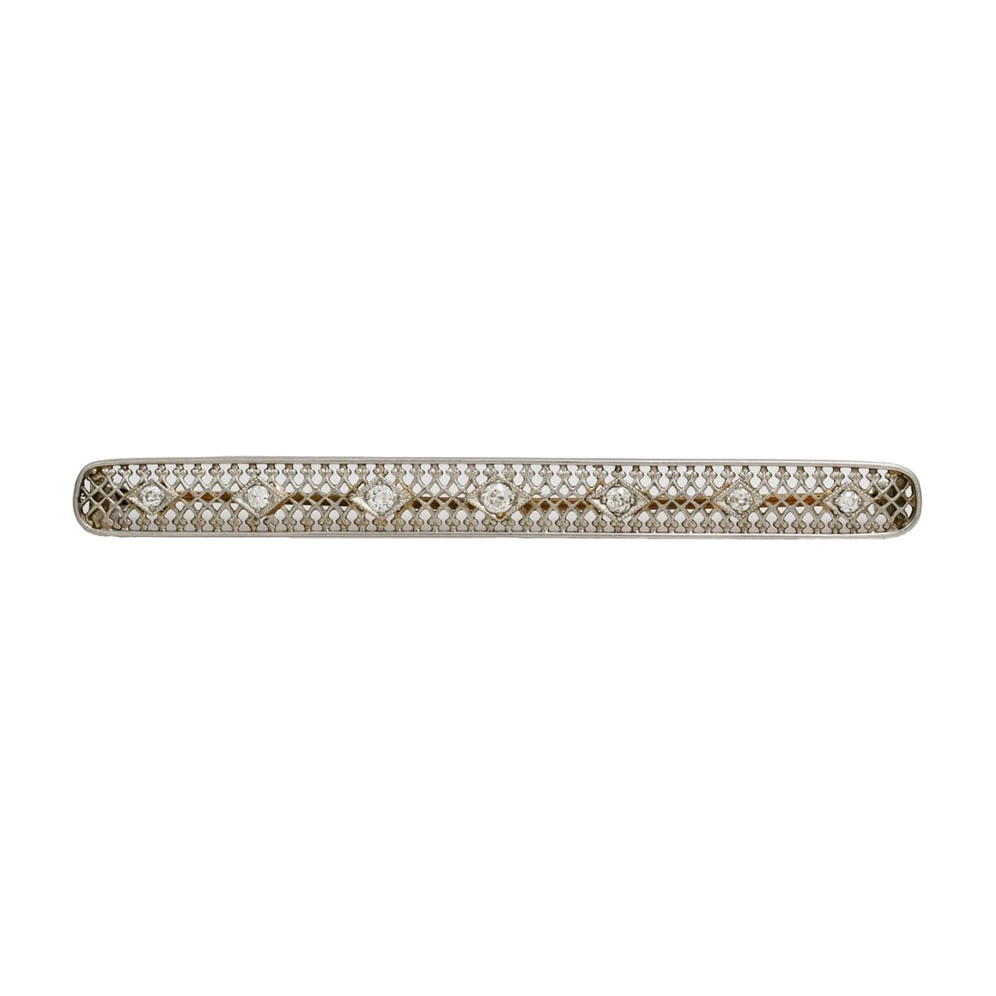 Art Deco Platinum Diamond Pin with 18K Yellow Gold Back: Art Deco Platinum Diamond Pin with 18K Yellow Gold Back This antique Art Deco brooch features seven old European cut natural diamonds set in platinum, with a secure 18K yellow gold pin on the back. Th