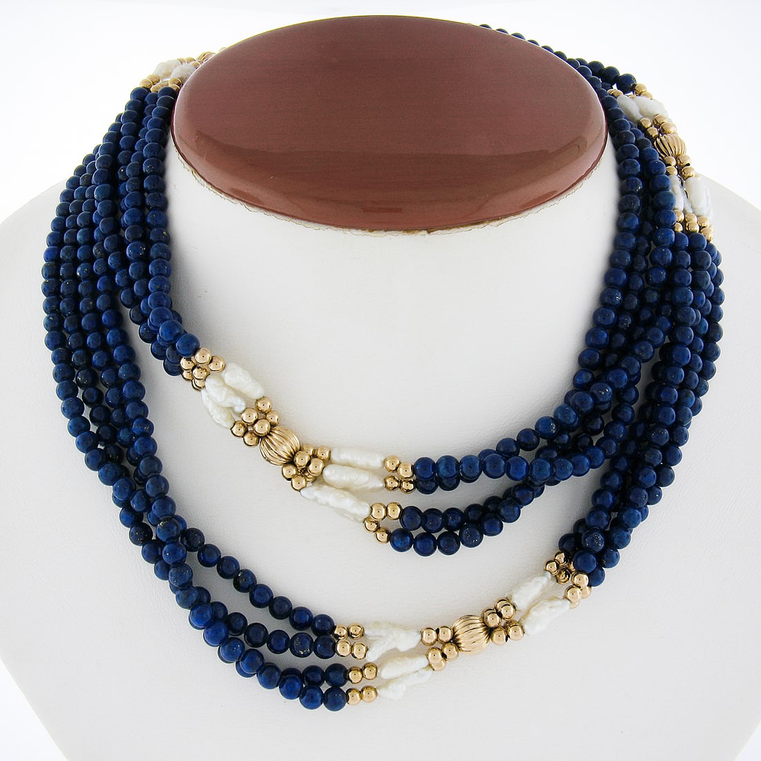 31in Multi Strand Lapis Lazuli Freshwater Pearl Necklace 14k Gold Clasp: 31in Multi Strand Lapis Lazuli Freshwater Pearl Necklace 14k Gold Clasp Vintage multi-strand necklace featuring alternating lapis lazuli, freshwater pearl, and 14k yellow gold beads. This beaded state