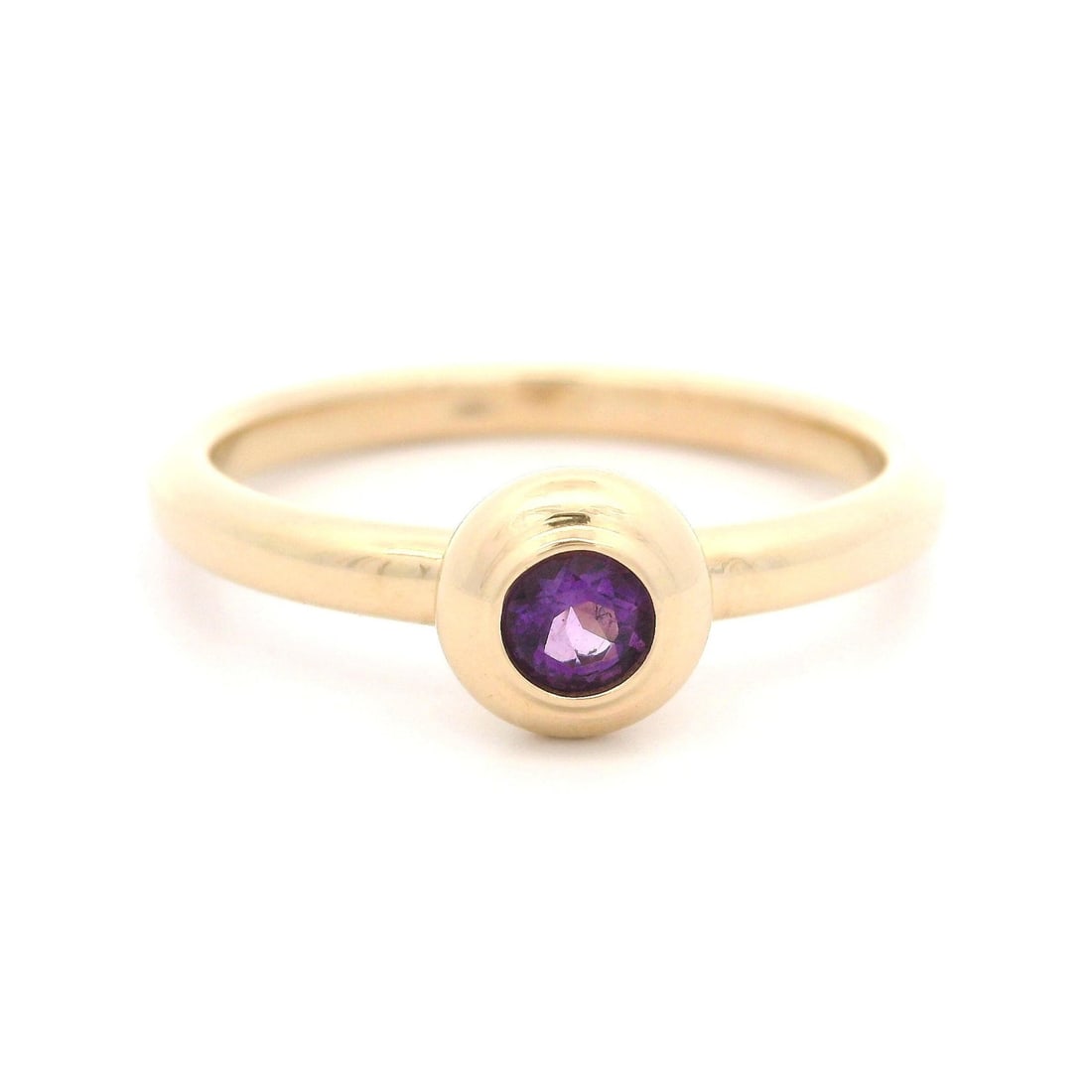 14k Yellow Gold 0.18ct Round Amethyst Bezel Stack Ring: 14k Yellow Gold 0.18ct Round Amethyst Bezel Stack Ring This exquisite 14k Yellow Gold ring features a stunning 0.18ct round natural amethyst, elegantly bezel-set to showcase its rich purple hue. The r