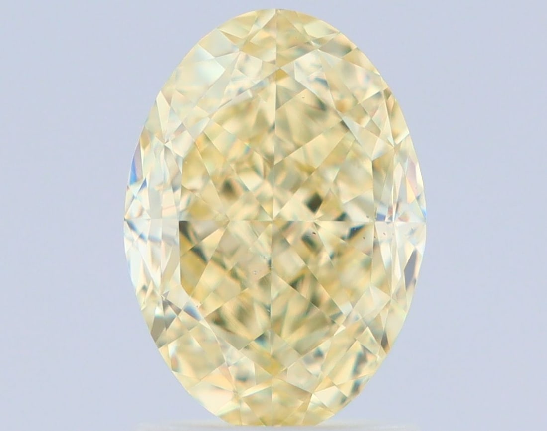 Loose Diamond - OVAL 2.01ct Fancy Light Yellow VS2: Loose Diamond - OVAL 2.01ct Fancy Light Yellow VS2 Source: Natural Shape: OVAL Carats: 2.01 Color: Fancy Light Yellow Certification: GIA Video: