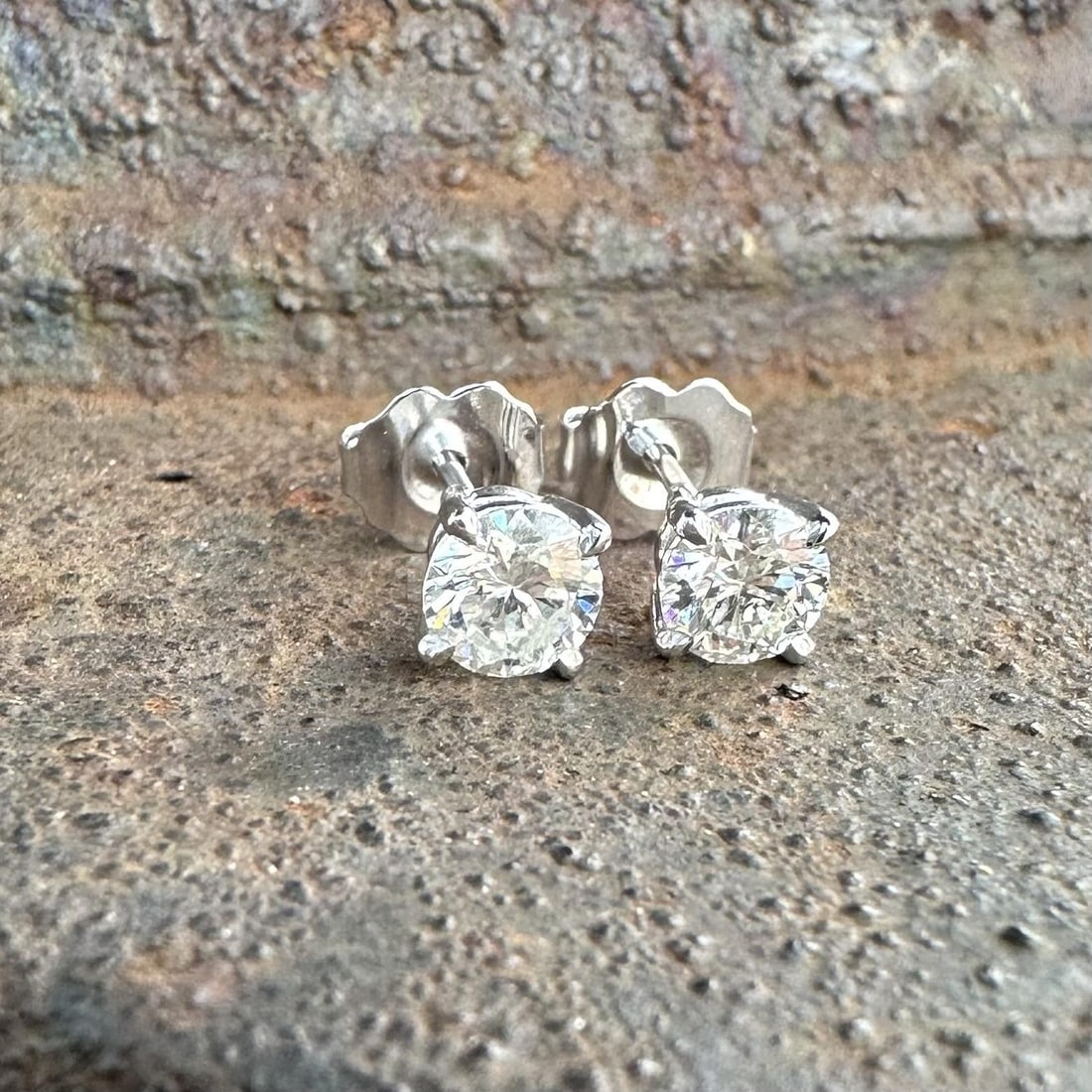 14k White Gold Stud Earrings with 0.75ctw H VS Natural Diamonds: 14k White Gold Stud Earrings with 0.75ctw H VS Natural Diamonds These stud earrings feature two natural round brilliant cut diamonds with a total carat weight of 0.75, set in solid 14k white gold. Eac