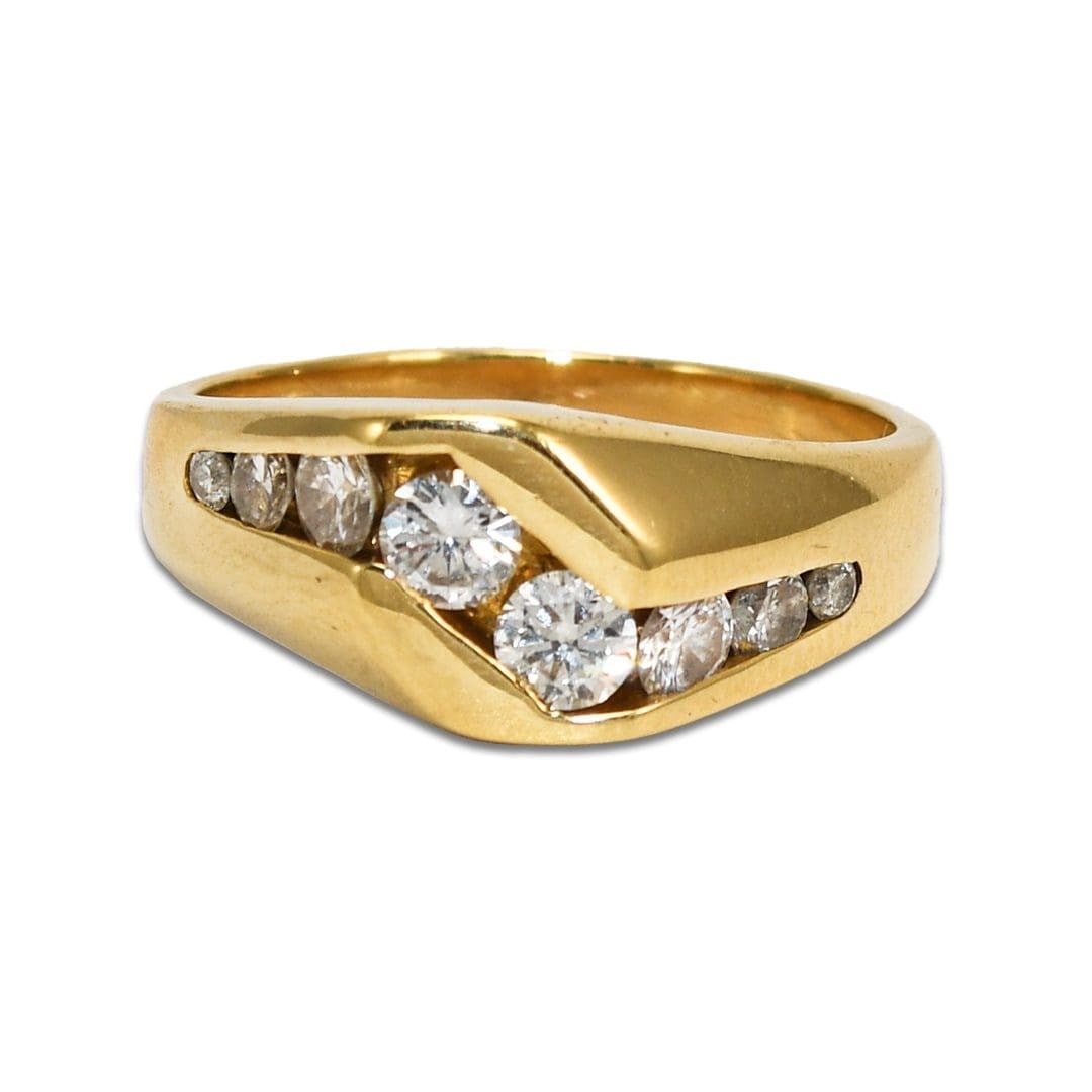 Curved 14K Yellow Gold Diamond Ring 0.80 TDW 8.5g Size 10: Curved 14K Yellow Gold Diamond Ring 0.80 TDW 8.5g Size 10 Pre-owned curved ring crafted in 14k yellow gold and set with natural round brilliant cut diamonds. The diamonds total 0.80 tdw and are tapere