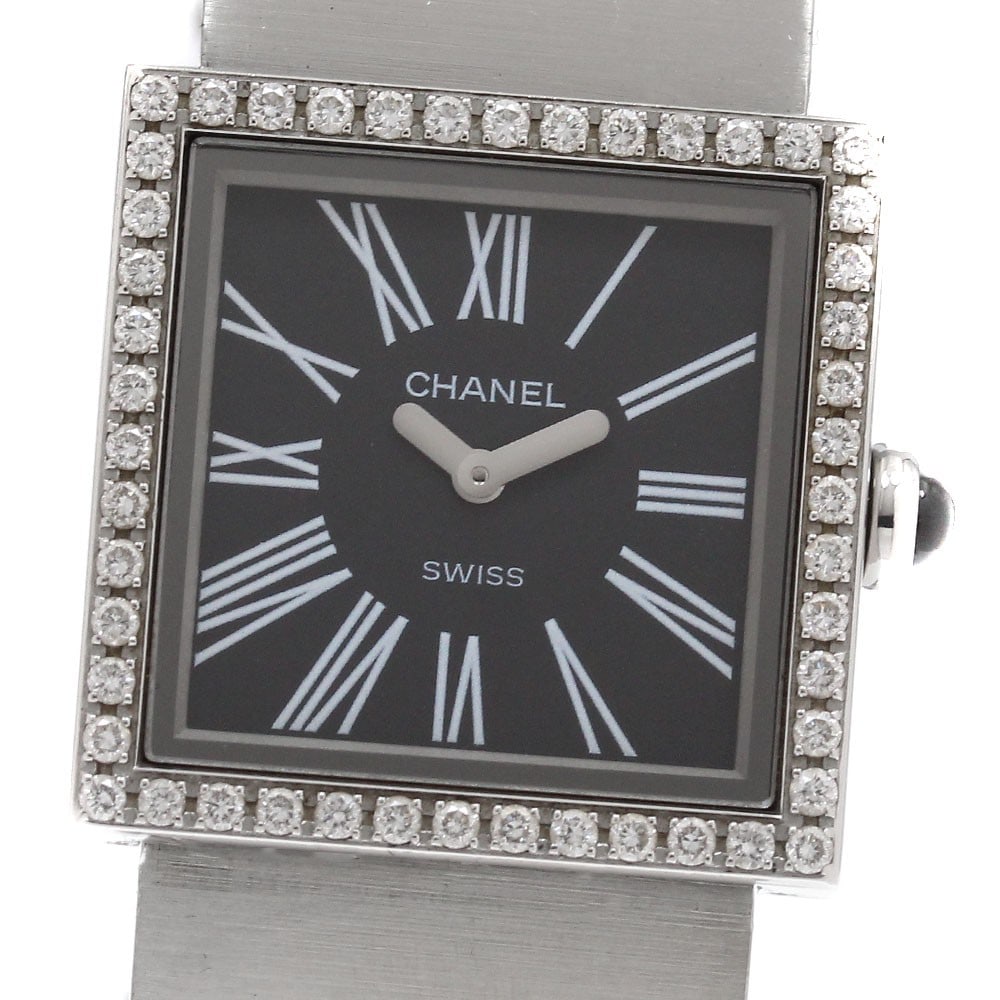 CHANEL Mademoiselle H0826 quartz wristwatch black dial steel: CHANEL Mademoiselle H0826 quartz wristwatch black dial steel Pre-owned CHANEL Mademoiselle women's wristwatch with a diamond bezel and quartz movement. This Swiss-made watch features a black dial and 