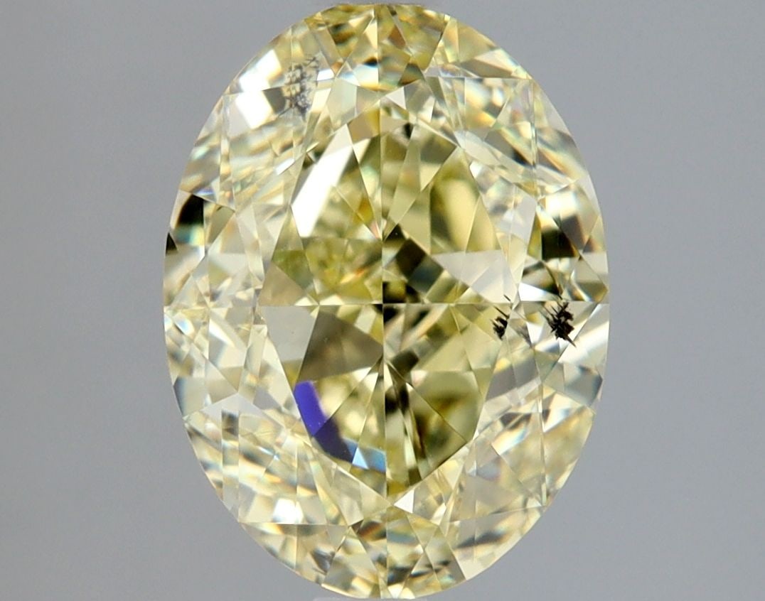 Loose Diamond - OVAL 2.32ct Fancy Yellow SI2: Loose Diamond - OVAL 2.32ct Fancy Yellow SI2 Source: Natural Shape: OVAL Carats: 2.32 Color: Fancy Yellow Certification: GIA Video: