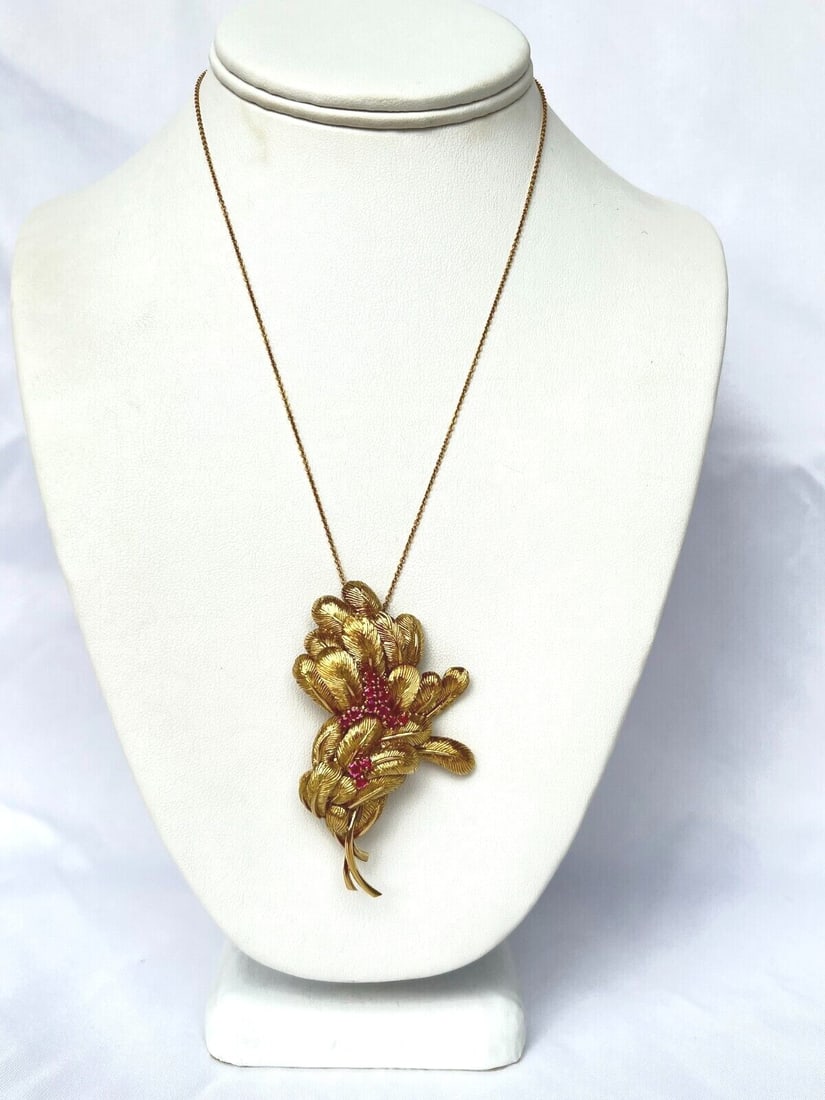 Tiffany & Co 18K Gold Ruby Necklace Brooch with Chain and Box: Tiffany & Co 18K Gold Ruby Necklace Brooch with Chain and Box Elevate your jewelry collection with this exquisite Tiffany & Co. 18K yellow gold ruby necklace brooch. This stunning piece features a tot