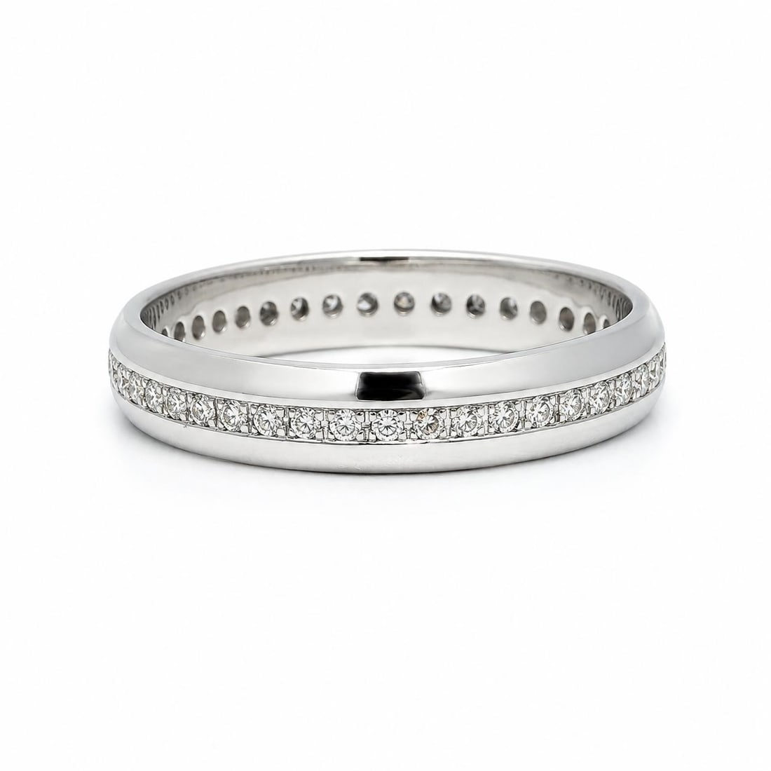 Unbranded 18k White Gold Eternity Band Ring with 0.25ctw Pave Diamonds: Unbranded 18k White Gold Eternity Band Ring with 0.25ctw Pave Diamonds Pre-owned women's eternity band ring in solid 18k white gold with a low-profile design, polished edges, and pave-set natural roun
