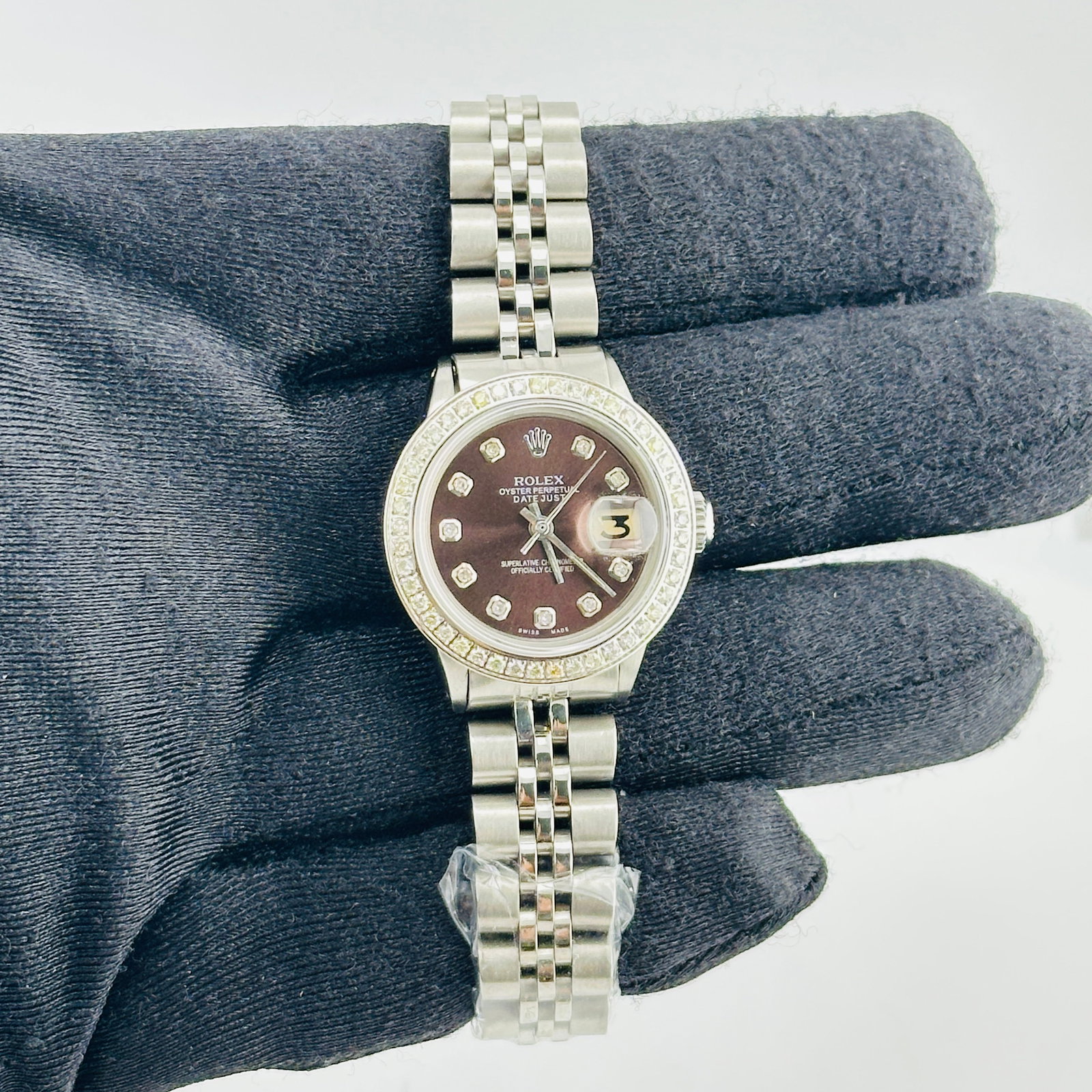 Rolex Datejust Ladies Watch Ref. 6516 Aftermarket Diamond Dial Bracelet: Rolex Datejust Ladies Watch Ref. 6516 Aftermarket Diamond Dial Bracelet Ladies Rolex Datejust reference 6516 featuring an Aftermarket brown diamond dial, pave diamond bezel, and Aftermarket Jubilee br