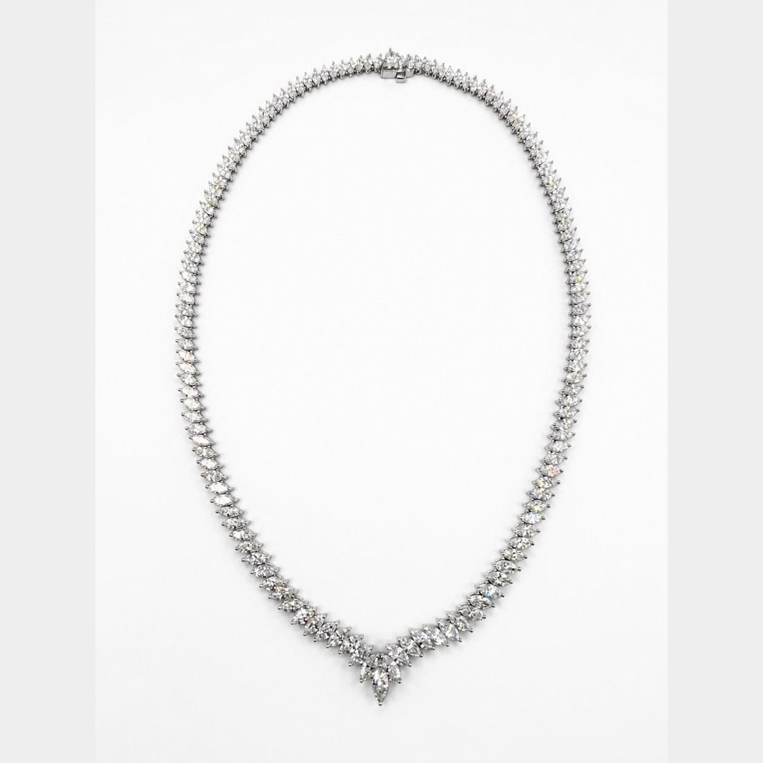 Platinum Marquise Diamond Necklace 16.50 Ct 16 Inch: Platinum Marquise Diamond Necklace 16.50 Ct 16 Inch Pre-owned platinum necklace set with graduated marquise diamonds. The necklace features 138 marquise diamonds with an approximate total weight of 16
