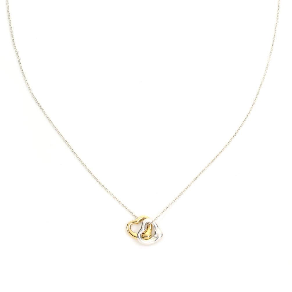 Tiffany & Co. Elsa Peretti Heart Pendant Sterling Silver 18k Gold Chain: Tiffany & Co. Elsa Peretti Heart Pendant Sterling Silver 18k Gold Chain This authentic Tiffany & Co. piece from the Elsa Peretti Open Heart collection showcases exquisite craftsmanship in both sterlin