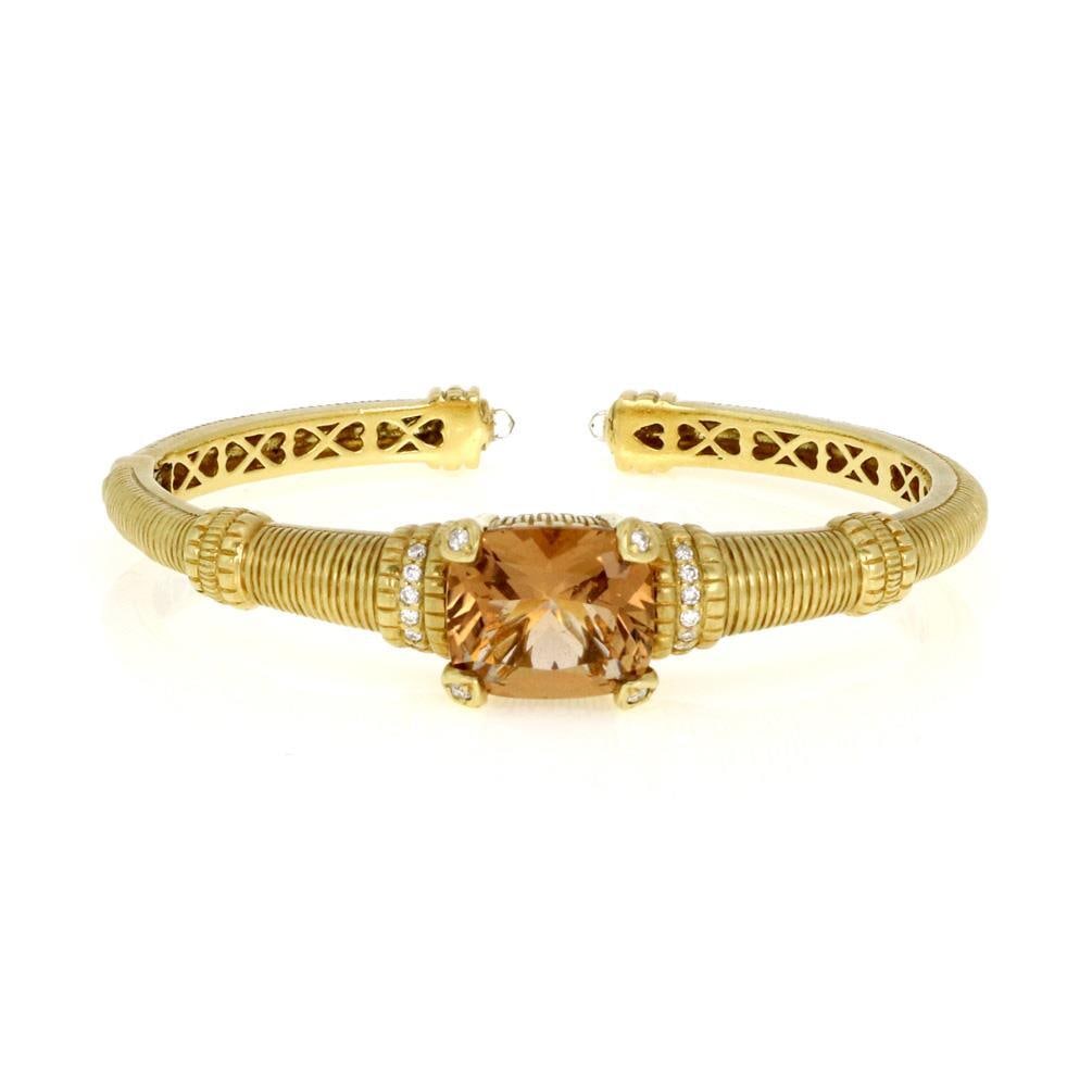 Judith Ripka 18k Gold Cuff Bracelet with Diamond and Citrine Gemstone: Judith Ripka 18k Gold Cuff Bracelet with Diamond and Citrine Gemstone This stunning cuff bracelet from Judith Ripka showcases a luxurious design crafted from 18k yellow gold with a polished textured f