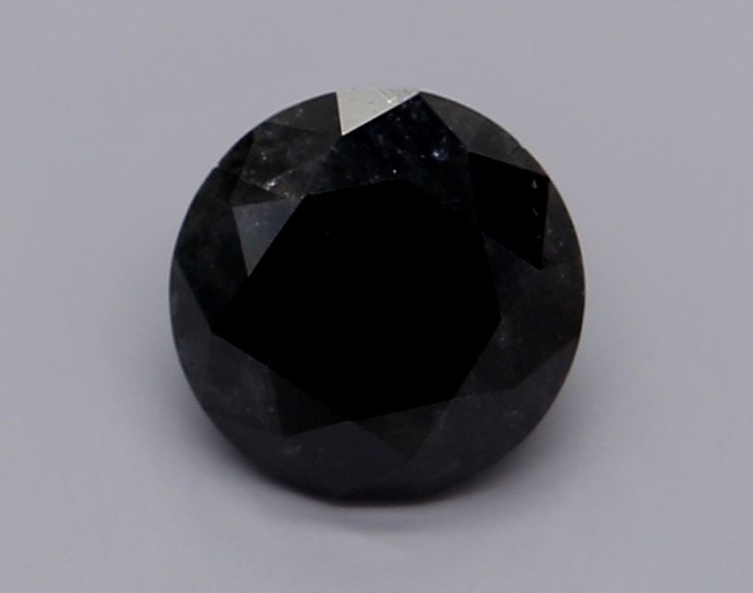 Loose Diamond - ROUND 1.08ct Fancy Black: Loose Diamond - ROUND 1.08ct Fancy Black Source: Natural Shape: ROUND Carats: 1.08 Color: Fancy Black Certification: IGI Video: