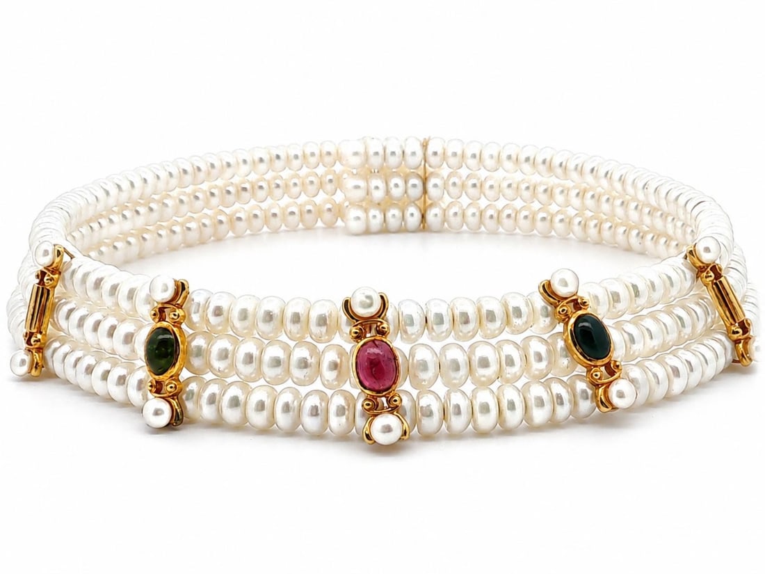 18k Yellow Gold Pearl Choker Necklace with 3 Tourmaline Spacers: 18k Yellow Gold Pearl Choker Necklace with 3 Tourmaline Spacers Flexible 3-row cultured pearl choker necklace with solid 18k yellow gold sections and spacers, accented by three natural tourmaline cabo