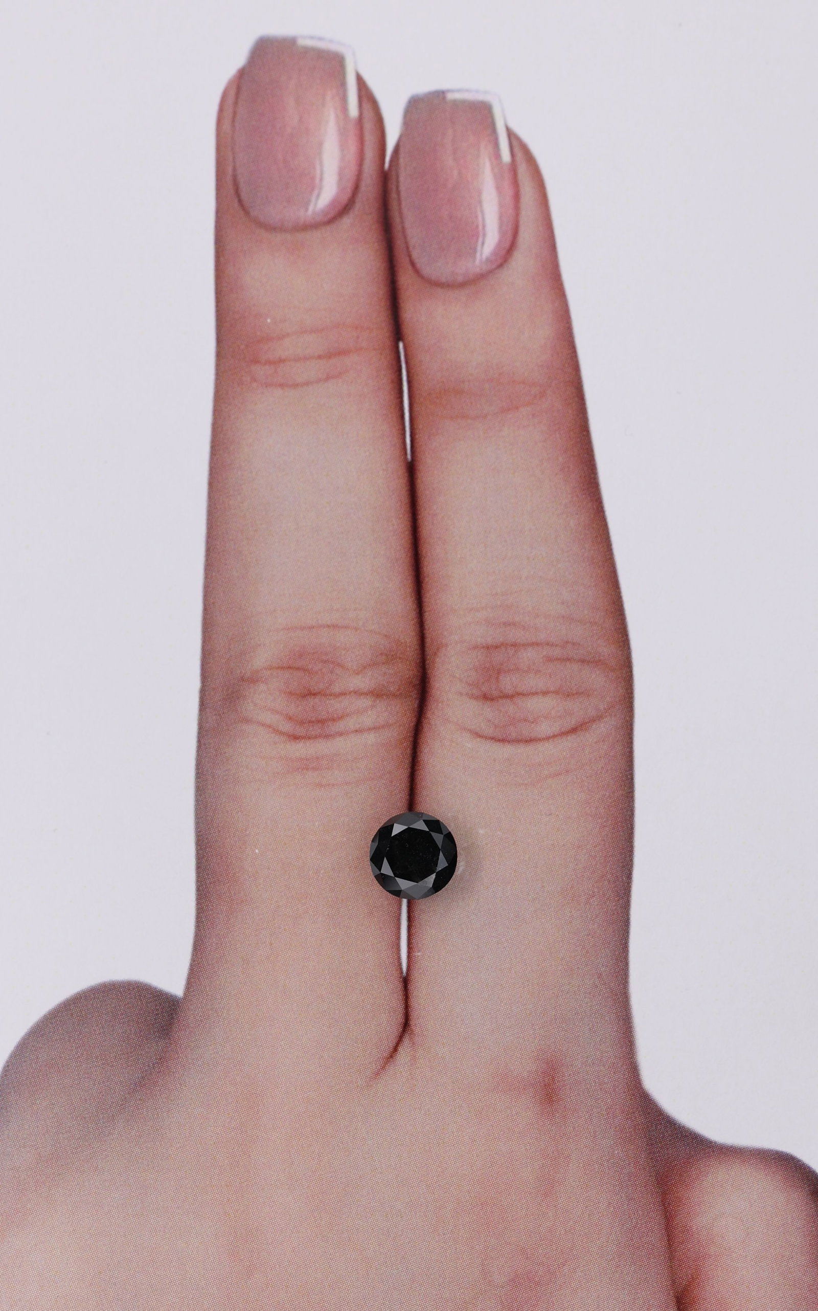 Loose Diamond - ROUND 1.16ct Black: Loose Diamond - ROUND 1.16ct Black Source: Natural Shape: ROUND Carats: 1.16 Color: Black Certification: IGI Video: