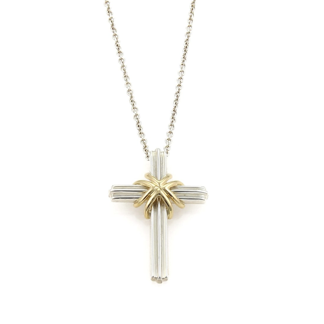 Tiffany & Co. Cross Pendant Necklace Sterling Silver 18k Yellow Gold: Tiffany & Co. Cross Pendant Necklace Sterling Silver 18k Yellow Gold Original Tiffany & Co. cross pendant necklace in sterling silver and 18k yellow gold. This signed fine jewelry piece features a mix