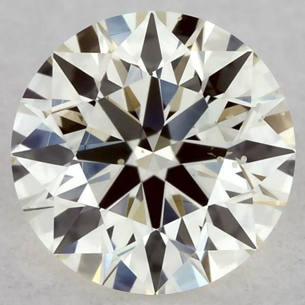 Loose Diamond - ROUND 0.39ct M SI1: Loose Diamond - ROUND 0.39ct M SI1 Source: Natural Shape: ROUND Carats: 0.39 Color: M Clarity: SI1 Certification: GIA The Diamond Depot Guarantee: All items in this auction are guaranteed to be 100% a
