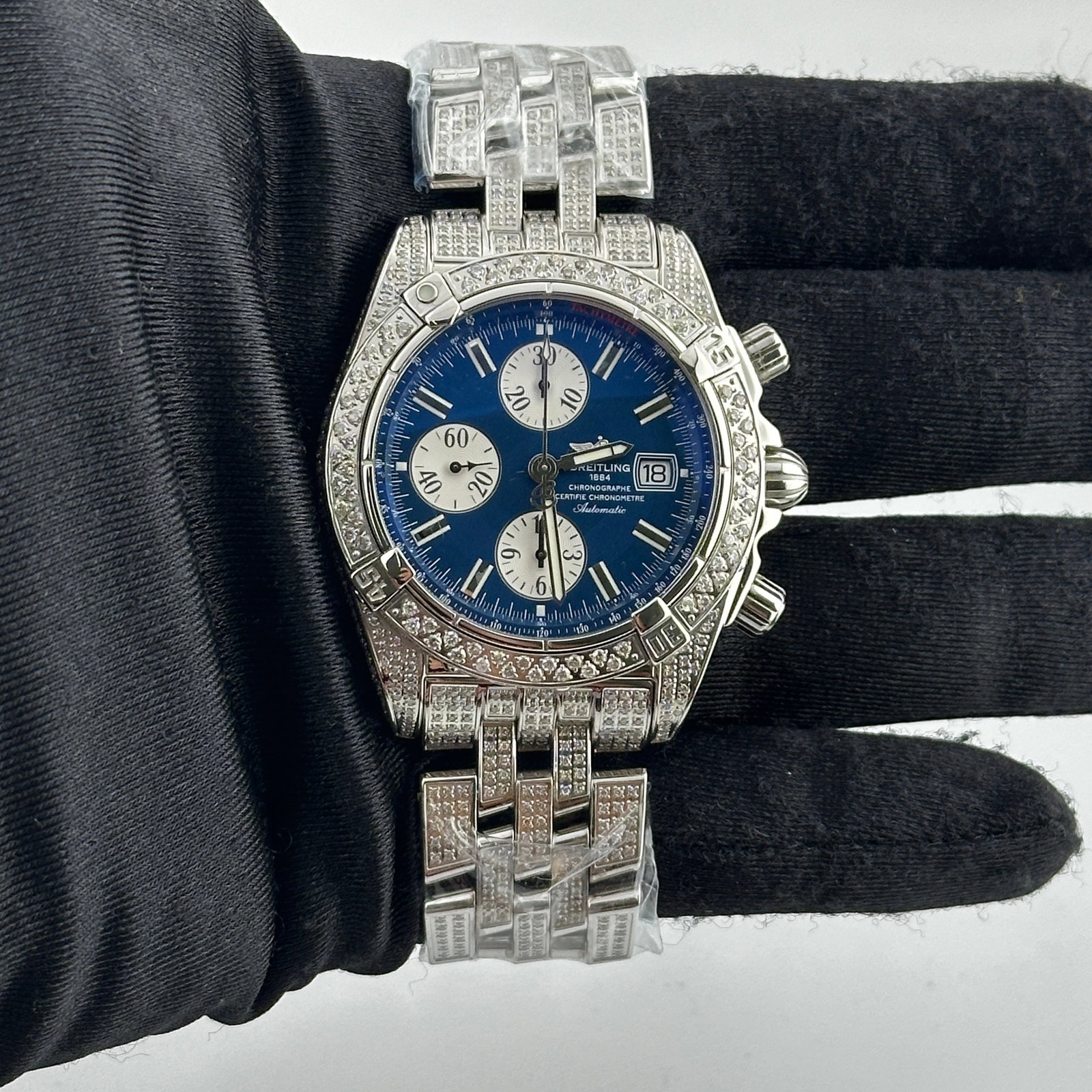 Breitling Chronomat Evolution A13356 Blue Dial Diamond Bezel and Bracelet: Breitling Chronomat Evolution A13356 Blue Dial Diamond Bezel and Bracelet This Breitling Chronomat Evolution features a striking blue dial and is designed for men. The watch is accented with a diamond