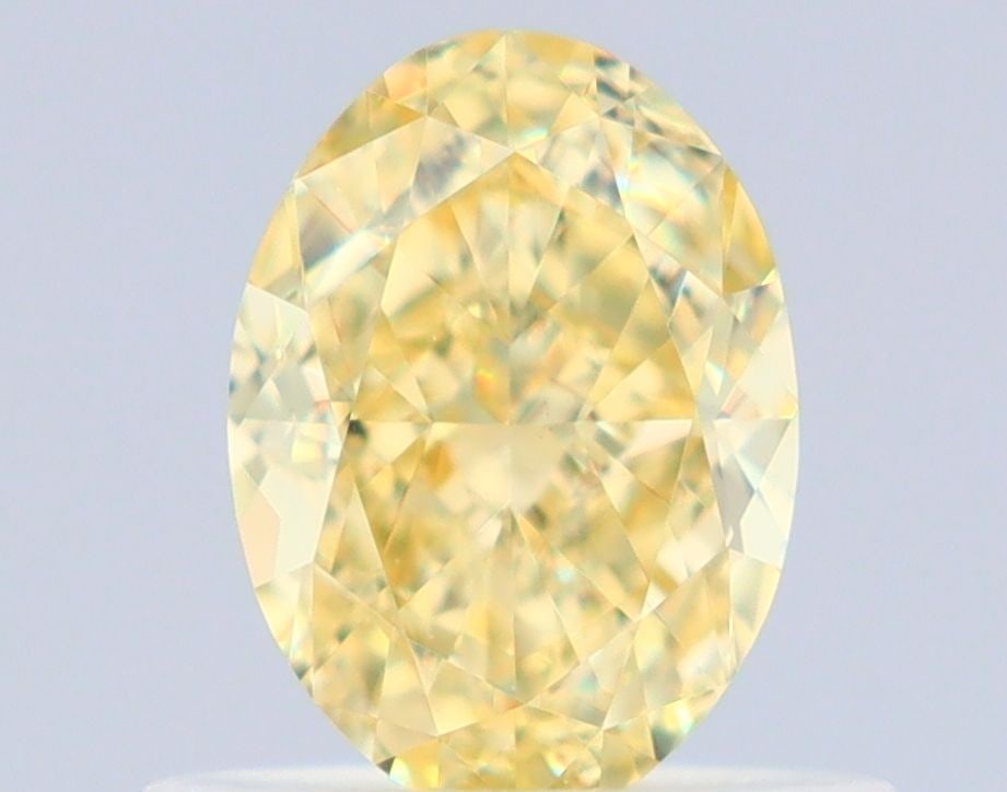 Loose Diamond - OVAL 0.7ct Fancy Yellow VVS2: Loose Diamond - OVAL 0.7ct Fancy Yellow VVS2 Source: Natural Shape: OVAL Carats: 0.7 Color: Fancy Yellow Certification: GIA Video: