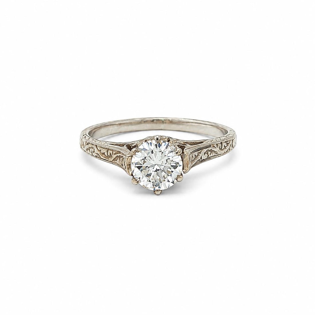 Unbranded 14k White Gold Solitaire Ring with 0.28ct Natural Diamond: Unbranded 14k White Gold Solitaire Ring with 0.28ct Natural Diamond Vintage ornate solitaire ring crafted in solid 14k white gold and set with one natural round brilliant cut diamond in a prong settin