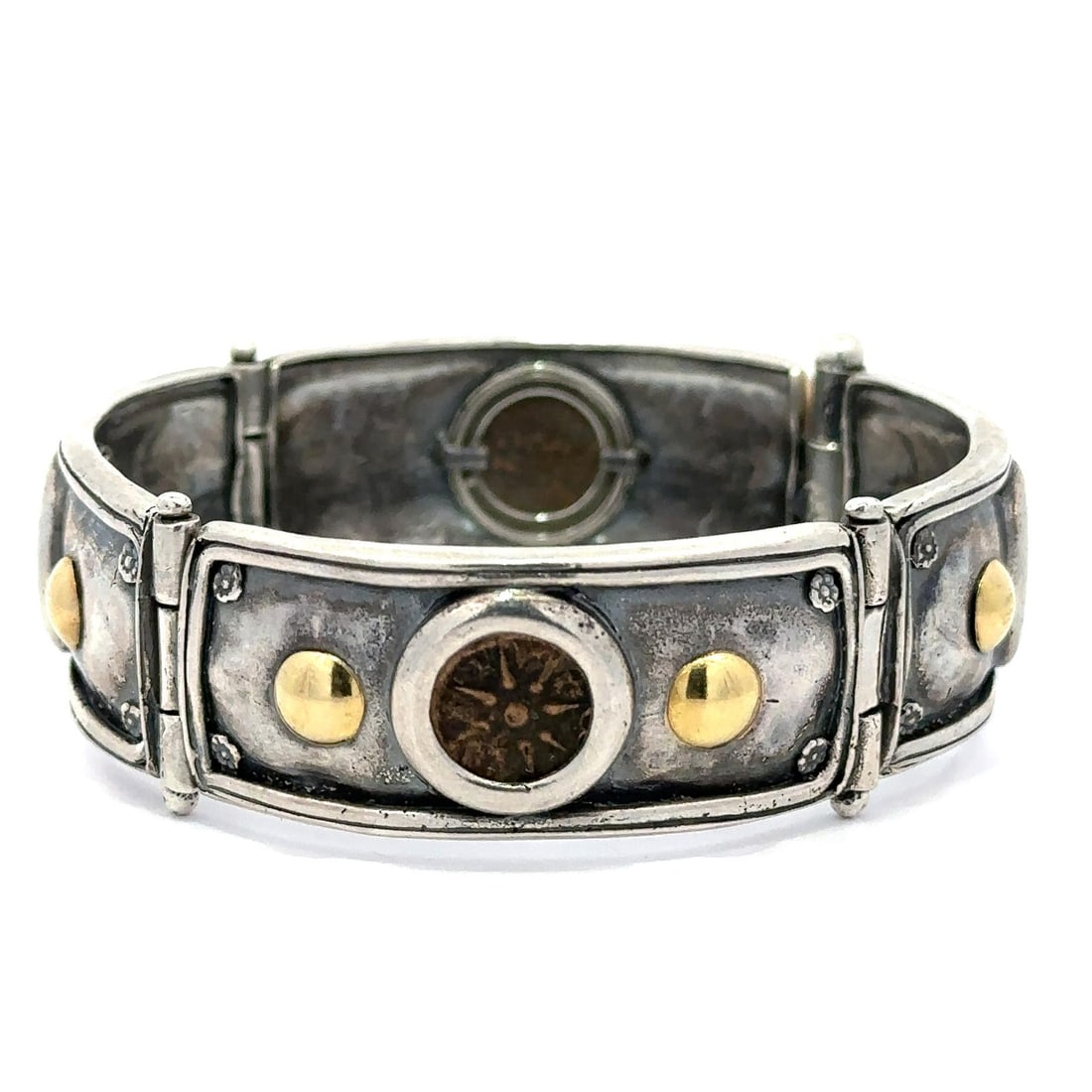 Handcrafted Sterling Silver and 18k Gold Bangle with Ancient Coin Panels: Handcrafted Sterling Silver and 18k Gold Bangle with Ancient Coin Panels This vintage bangle bracelet features a handmade design crafted from solid sterling silver with wide panel links accented by 18