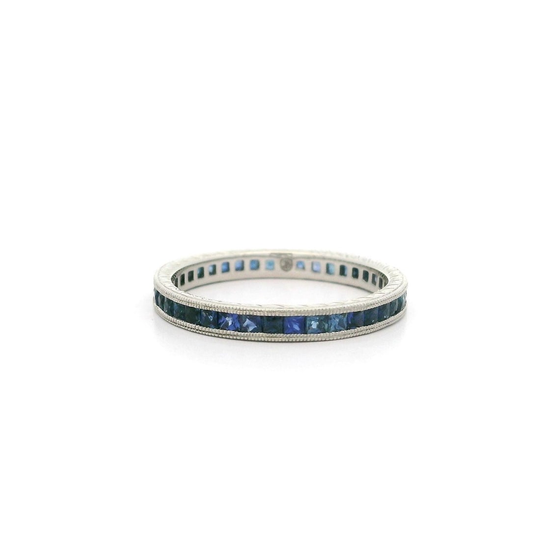 Platinum Eternity Band Ring with Blue Sapphire and Diamond: Platinum Eternity Band Ring with Blue Sapphire and Diamond This exquisite Platinum French Cut Blue Sapphire Engraved Wheat Work Sides Eternity Band Ring showcases a stunning array of (41) natural genu