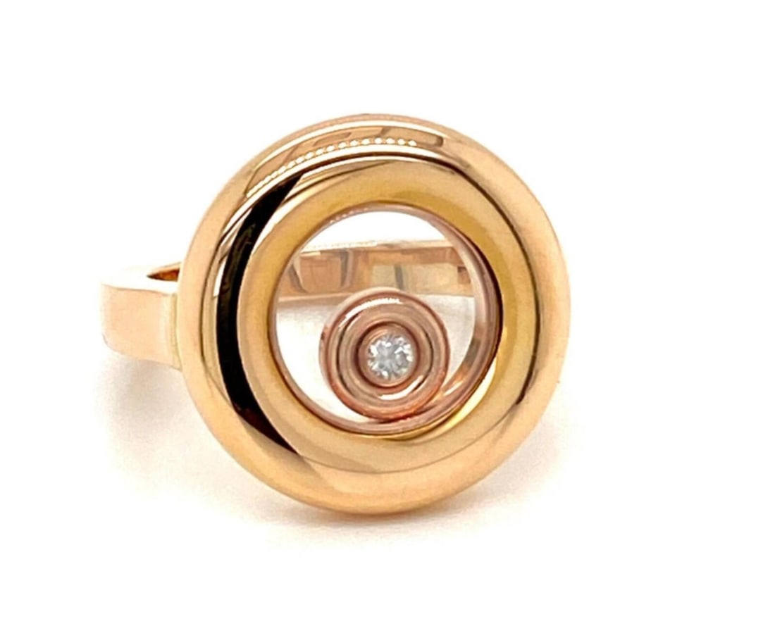 Chopard Happy Diamonds 18k Rose Gold Round Ring Size 6: Chopard Happy Diamonds 18k Rose Gold Round Ring Size 6 Pre-owned Chopard Happy Diamonds round floating diamond ring in 18k rose gold. This signed ring features a sculptural round motif accented by one