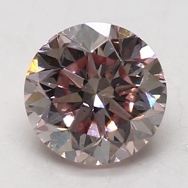 Loose Diamond - ROUND 0.57ct Fancy Light Pink VS2: Loose Diamond - ROUND 0.57ct Fancy Light Pink VS2 Source: Natural Shape: ROUND Carats: 0.57 Color: Fancy Light Pink Certification: GIA The Diamond Depot Guarantee: All items in this auction are guaran
