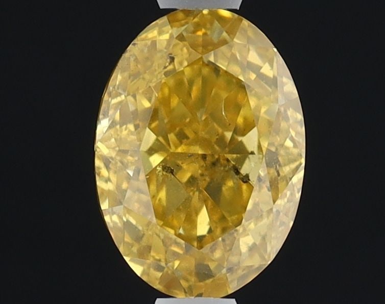 Loose Diamond - OVAL 1.01ct Fancy Brownish Orangey Yellow SI2: Loose Diamond - OVAL 1.01ct Fancy Brownish Orangey Yellow SI2 Source: Natural Shape: OVAL Carats: 1.01 Color: Fancy Brownish Orangey Yellow Certification: GIA Video: