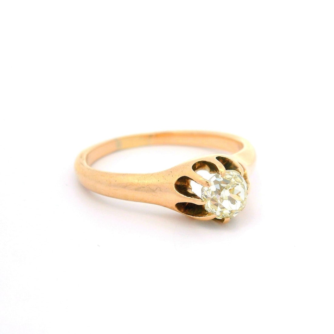 Victorian 10k Yellow Gold 0.52ctw Old Mine Cut Diamond Ring: Victorian 10k Yellow Gold 0.52ctw Old Mine Cut Diamond Ring This stunning antique Victorian ring features a 0.52 carat old mine cut diamond, recognized for its fiery warm yellow hue and very slightly 
