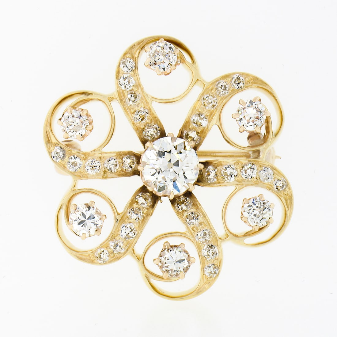 Antique Victorian 18k Gold 1.97ct Old European Diamond Flower Brooch: Antique Victorian 18k Gold 1.97ct Old European Diamond Flower Brooch This exquisite Antique Victorian brooch is crafted from solid 18k yellow gold and features a stunning open swirl flower design ador