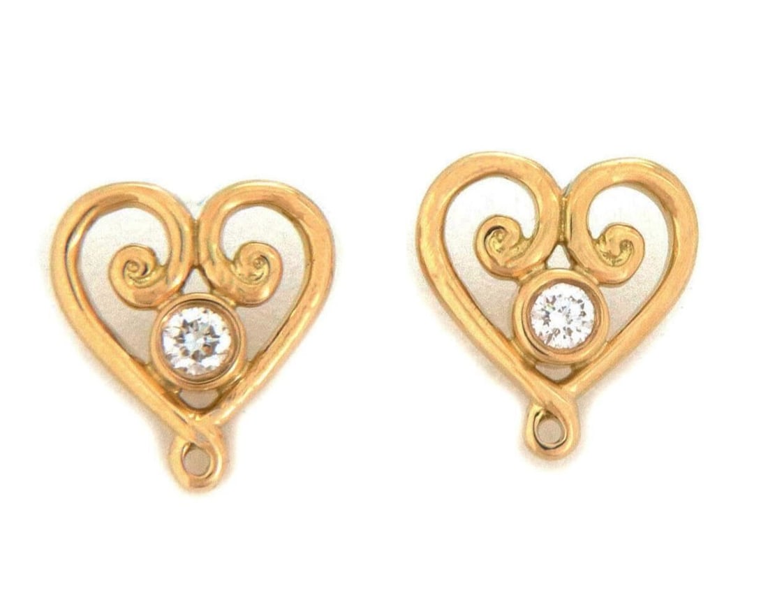 Tiffany & Co Paloma Picasso Venezia Goldoni 18k Gold Diamond Stud Earrings: Tiffany & Co Paloma Picasso Venezia Goldoni 18k Gold Diamond Stud Earrings A pair of Tiffany & Co. Paloma Picasso Venezia Goldoni stud earrings featuring the sculptural Venezia Goldoni motif with natu