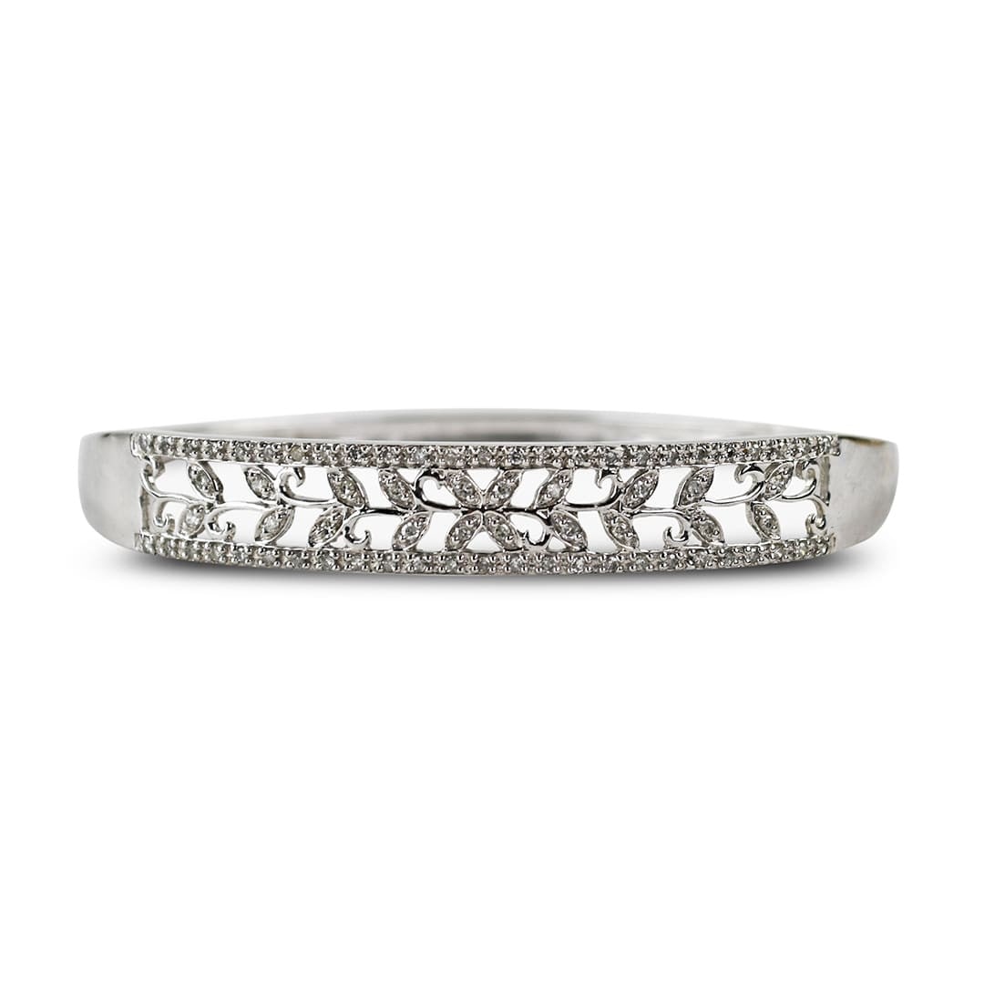 Diamond Hinged Bangle Bracelet in 10K White Gold 0.33ct: Diamond Hinged Bangle Bracelet in 10K White Gold 0.33ct Pre-owned 10k white gold diamond bangle bracelet with a retro-look design and attractive open-metal work. It features natural round single-cut d