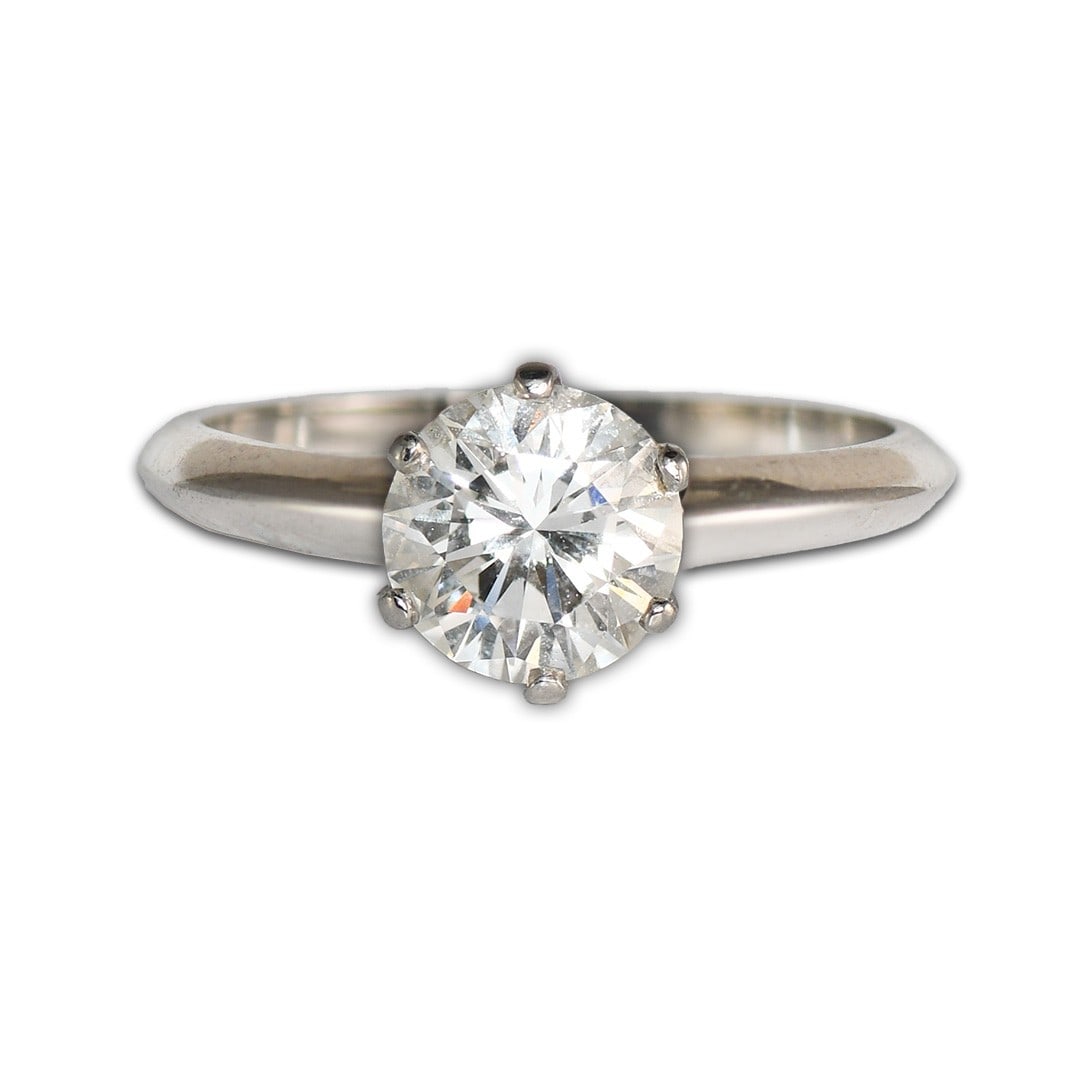 Tiffany & Co. Platinum Solitaire Ring 1.03 ct GIA Certified: Tiffany & Co. Platinum Solitaire Ring 1.03 ct GIA Certified This Platinum Tiffany & Co. Diamond Solitaire Ring features a natural 1.03-carat round brilliant diamond, graded by GIA with an F color, VS1