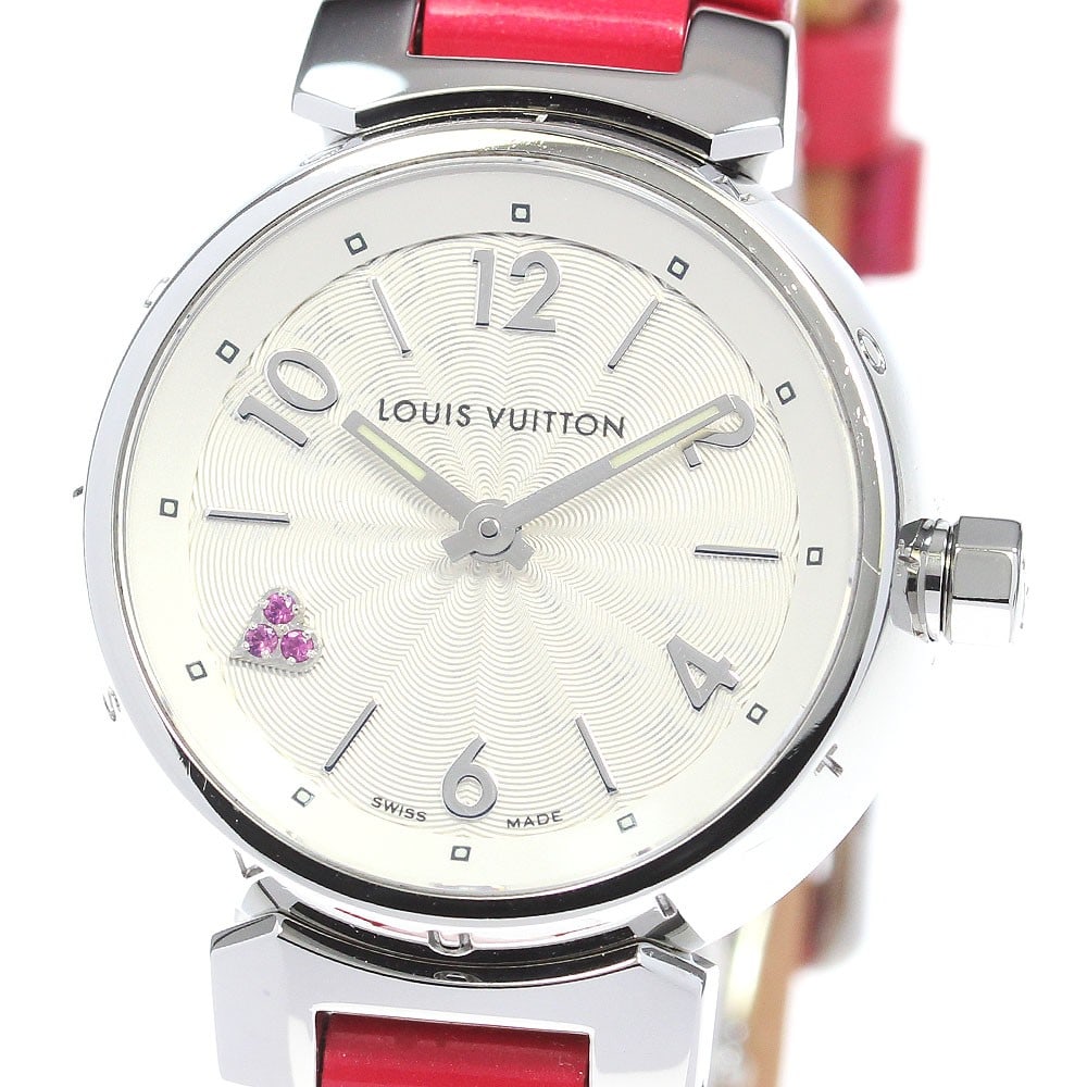 Louis Vuitton Tambour Heart Quartz Ladies Wristwatch Q1218: Louis Vuitton Tambour Heart Quartz Ladies Wristwatch Q1218 This Louis Vuitton Tambour Heart Q1218 is a stylish women's wristwatch featuring a stainless steel case and a leather and enamel belt. The wa