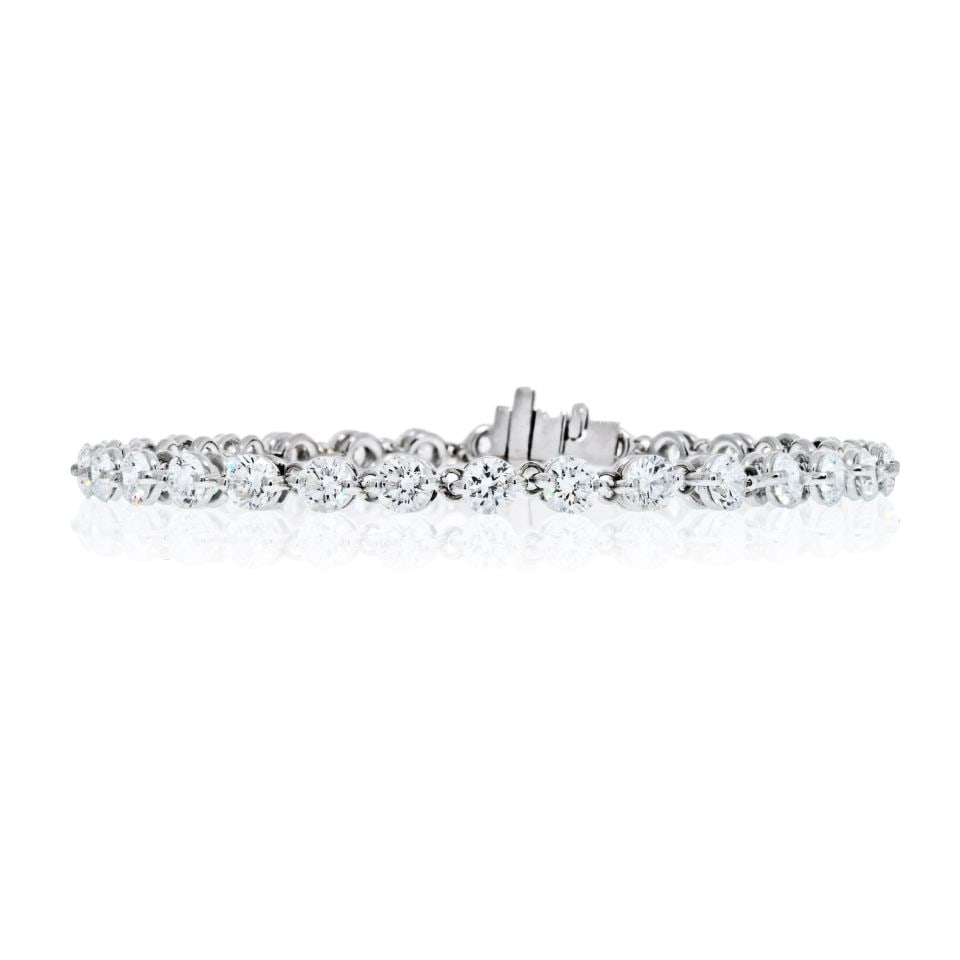 Platinum Tennis Bracelet 7.85ct Round Diamond Box Clasp: Platinum Tennis Bracelet 7.85ct Round Diamond Box Clasp This exquisite Tennis Bracelet showcases a stunning arrangement of round brilliant cut diamonds, totaling an impressive 7.85 carats. Crafted in 