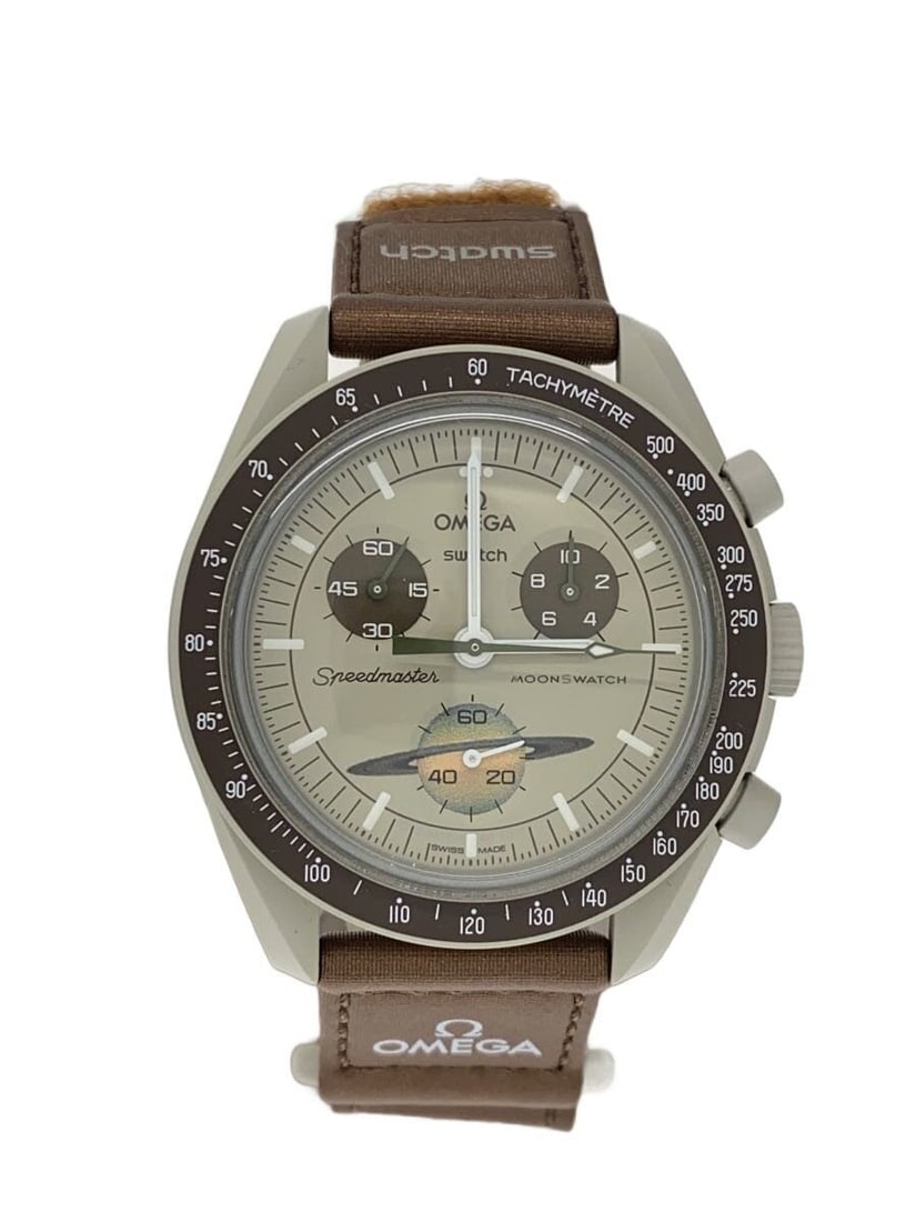 Omega x Swatch MoonSwatch Mission to Saturn Quartz Beige Wristwatch: Omega x Swatch MoonSwatch Mission to Saturn Quartz Beige Wristwatch This OMEGAxSWATCH MoonSwatch Speedmaster Mission to Saturn wristwatch features a quartz movement and a beige color scheme. Designed 