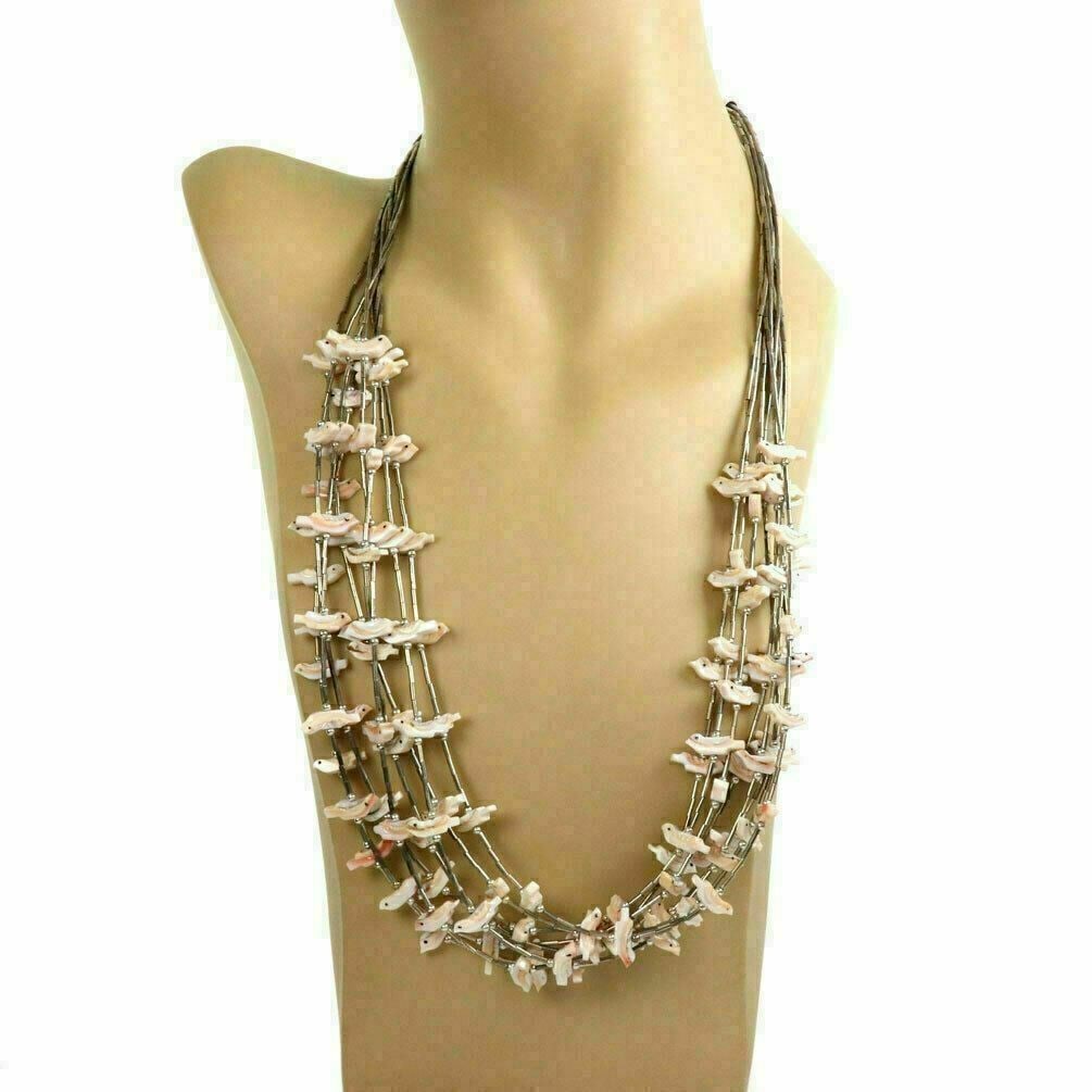 Sterling Silver 8 Strand Necklace with 112 Mother of Pearl Fetish Birds: Sterling Silver 8 Strand Necklace with 112 Mother of Pearl Fetish Birds Vintage estate multi-strand necklace featuring hand-carved mother of pearl fetish birds with sterling silver accents. The eight-