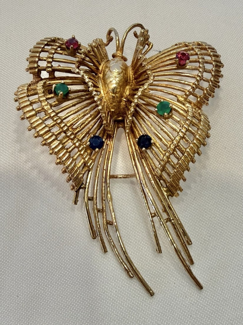 Butterfly Brooch Pendant in 14k Yellow Gold with Emerald Sapphire Amethyst: Butterfly Brooch Pendant in 14k Yellow Gold with Emerald Sapphire Amethyst This exquisite 14k yellow gold butterfly pendant brooch showcases vibrant emerald, sapphire, and amethyst gemstones. Featurin