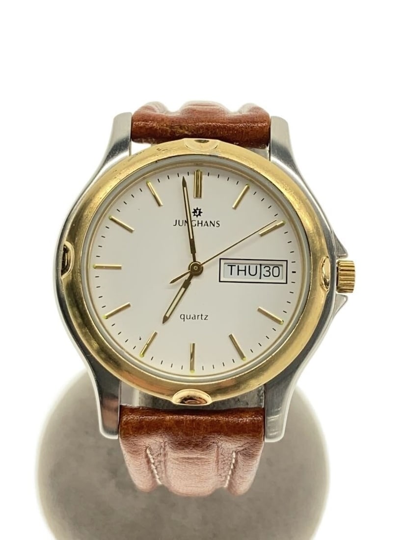 Junghans 41 4002 Quartz Leather Strap Wristwatch: Junghans 41 4002 Quartz Leather Strap Wristwatch This JUNGHANS Quartz 41/4002 men's wristwatch features a white dial and a leather band. Made in Germany, the watch exhibits slight signs of use and min