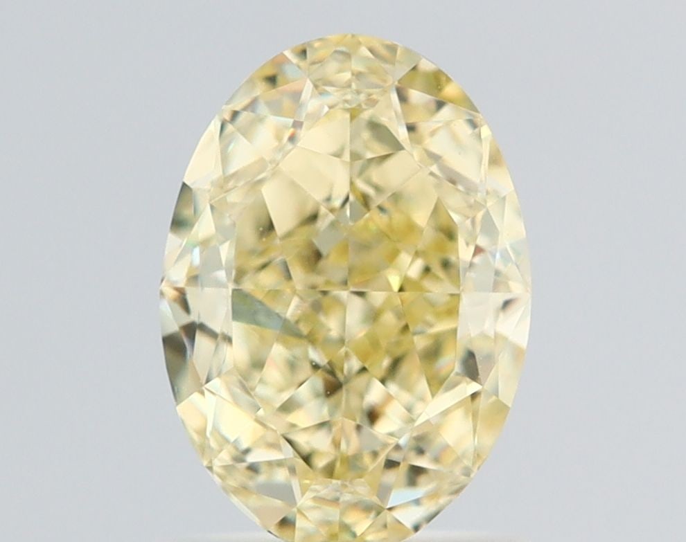 Loose Diamond - OVAL 1.5ct Fancy Light Yellow VS1: Loose Diamond - OVAL 1.5ct Fancy Light Yellow VS1 Source: Natural Shape: OVAL Carats: 1.5 Color: Fancy Light Yellow Certification: GIA The Diamond Depot Guarantee: All items in this auction are guaran