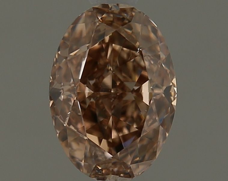 Loose Diamond - OVAL 1.01ct Fancy Orange Brown SI2: Loose Diamond - OVAL 1.01ct Fancy Orange Brown SI2 Source: Natural Shape: OVAL Carats: 1.01 Color: Fancy Orange Brown Certification: GIA Video: