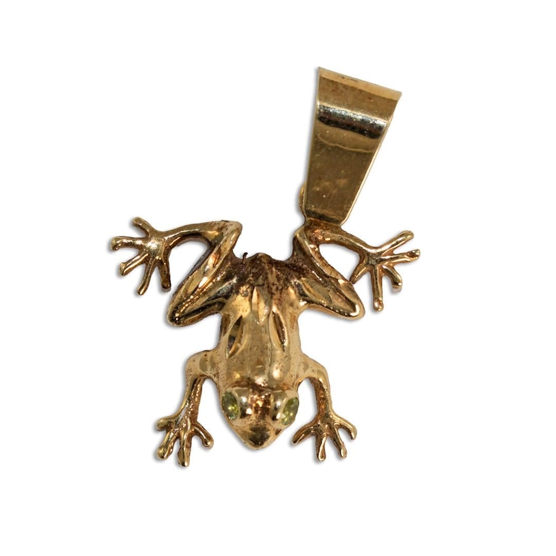 Unbranded 14k Yellow Gold Frog Pendant 5.3gr: Unbranded 14k Yellow Gold Frog Pendant 5.3gr Pre-owned 14k yellow gold frog pendant with a gold-tone finish and two gemstones. The piece is stamped 14k and X-ray tested at 53% pure. Specifications Bra